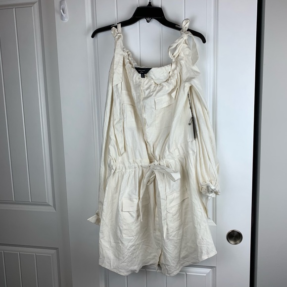 Chrissy Teigen REVOLVE Dragontail Button D… - Picture 4 of 7